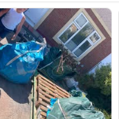 Waste bags collected curbside ready for removal