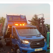 Clean Up Crew tipper van loaded with waste at sunrise